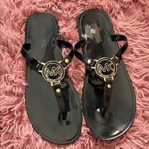 Michael Kors Black Jelly Thong Sandals with Gold MK Medallion